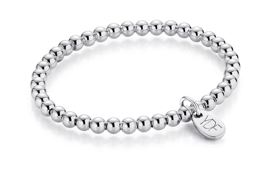 Stretch Silberarmband und Loganhänger mit Diamant